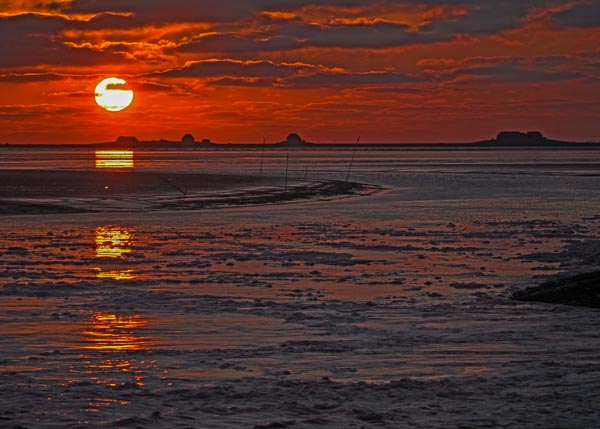 Sonnenuntergang am Holmer Siel